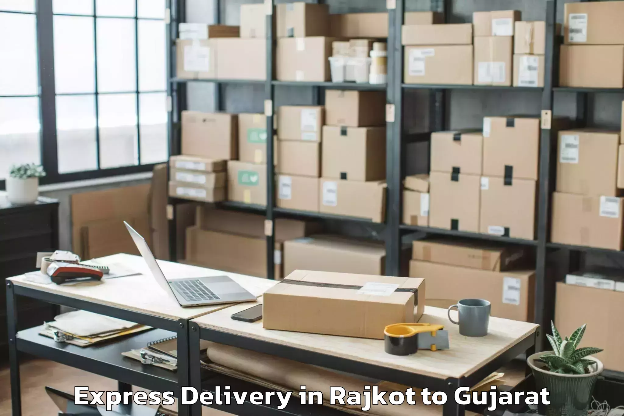 Top Rajkot to Abhilashi University Surat Express Delivery Available